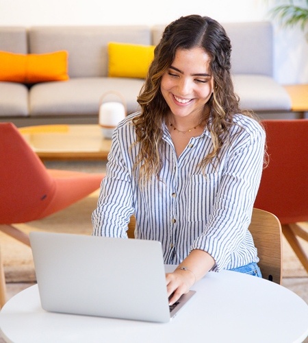 a woman checking a PC